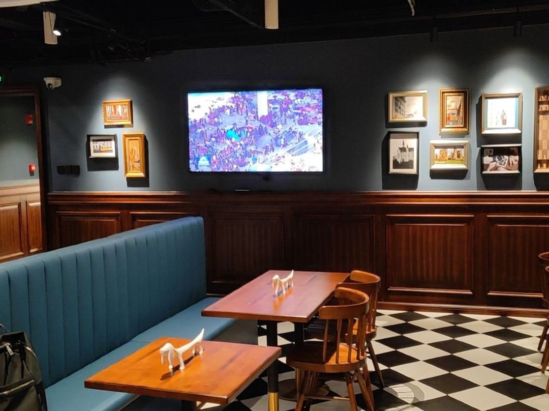 Restaurant tabletops in different finishes arranged for a commercial dining furniture project