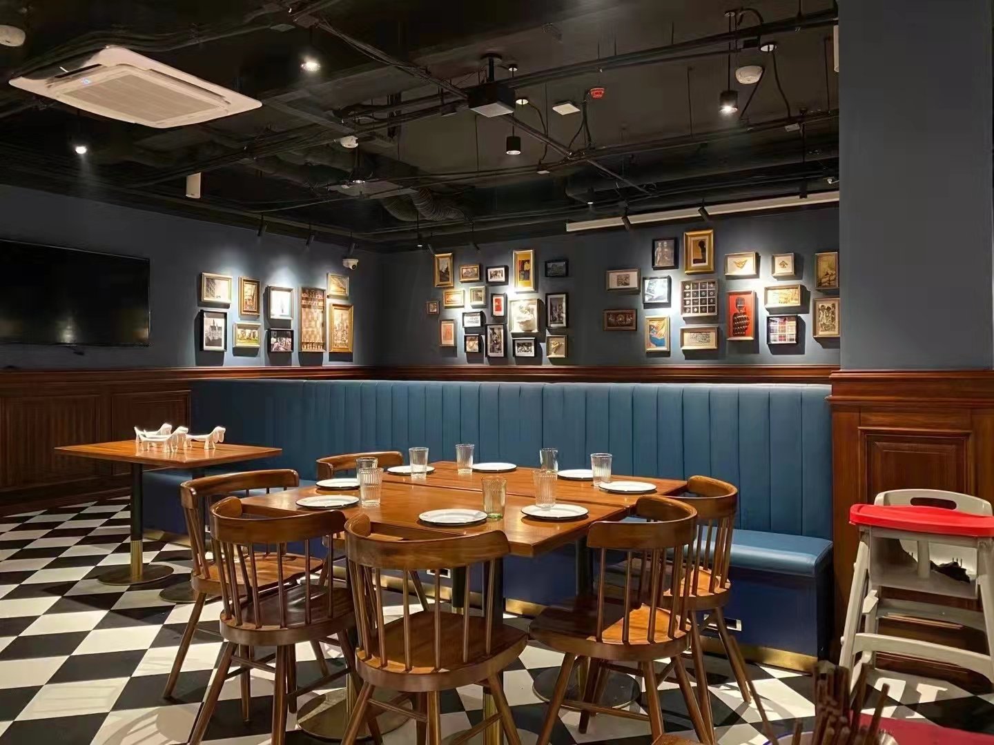 Metal and wooden restaurant dining chairs compared in a commercial restaurant seating area