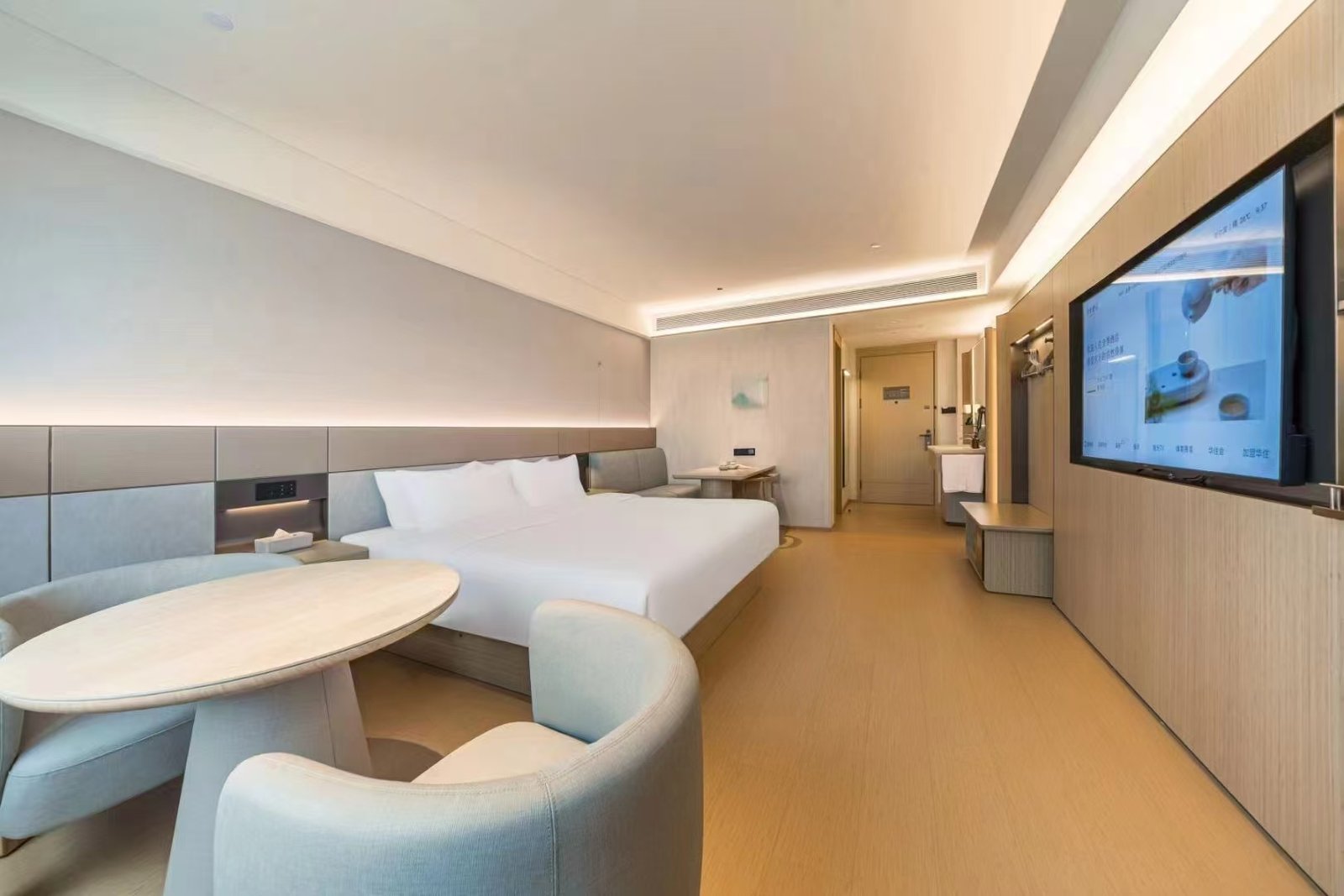 Luxury hotel furniture with custom casegoods seating and coordinated premium finishes